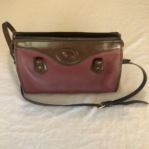 Classic Dooney and Bourke pocketbook.